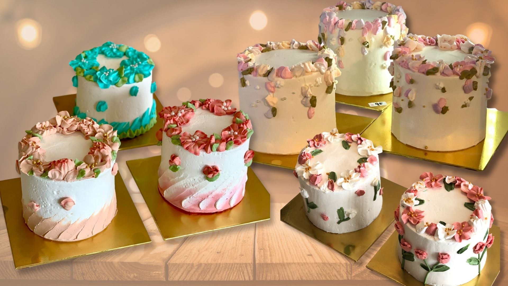 A beautiful display of various petite cakes on a platter.